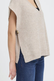 Damen Strickponcho Beige – ärmellos mit V - Ausschnitt - Blossom Hair & Fashion