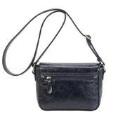 Blaue Schultertasche im Blumenmuster - Blossom Hair & Fashion