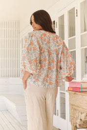 Bluse mit Blumenmuster und weitem Ausschnitt - Blossom Hair & Fashion