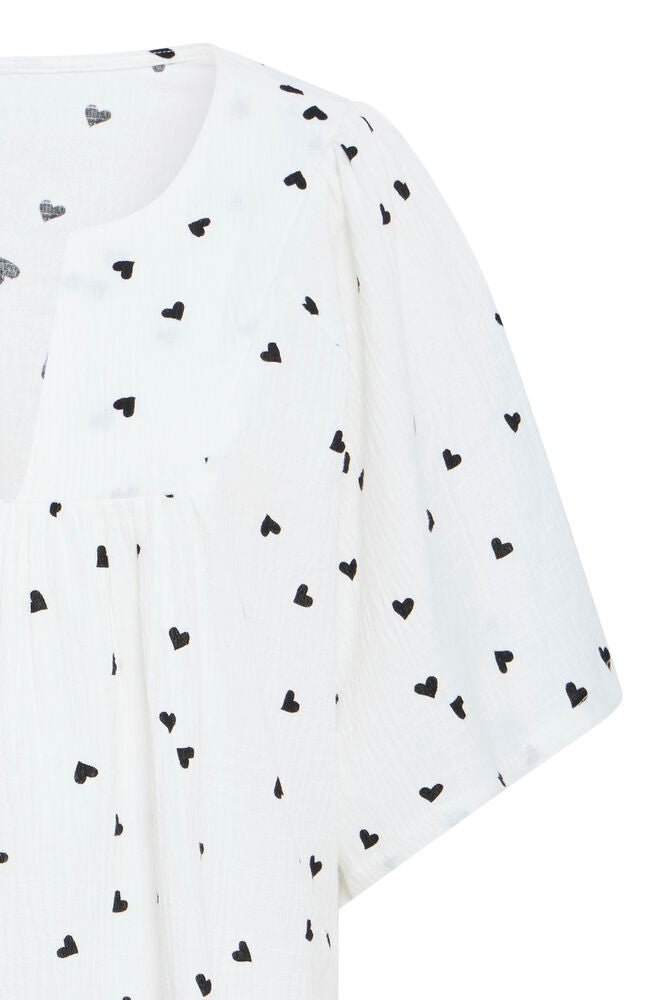 Bluse mit Muster und V - Ausschnitt in schwarz oder weiss - Blossom Hair & Fashion