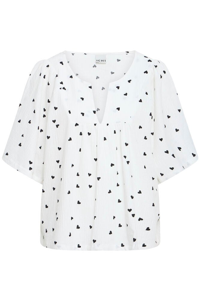 Bluse mit Muster und V - Ausschnitt in schwarz oder weiss - Blossom Hair & Fashion