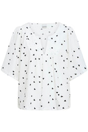 Bluse mit Muster und V - Ausschnitt in schwarz oder weiss - Blossom Hair & Fashion