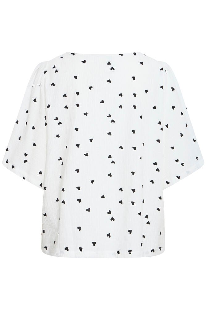 Bluse mit Muster und V - Ausschnitt in schwarz oder weiss - Blossom Hair & Fashion