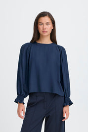 Dunkelblaue Bluse mit Strukturärmeln - Blossom Hair & Fashion