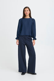 Dunkelblaue Bluse mit Strukturärmeln - Blossom Hair & Fashion