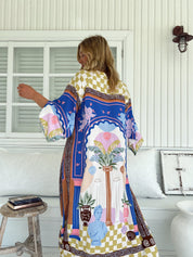 Maxikleid mit Muster und V - Ausschnitt - Blossom Hair & Fashion