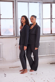 Schwarze Stoffhose mit weitem Bein - Blossom Hair & Fashion