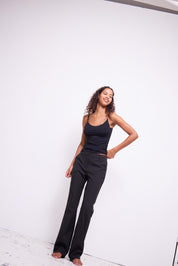 Schwarze Stoffhose mit weitem Bein - Blossom Hair & Fashion