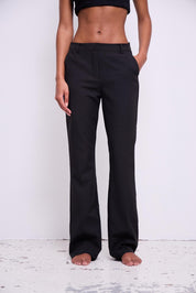 Schwarze Stoffhose mit weitem Bein - Blossom Hair & Fashion