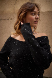 Schwarzer Glitzerpullover mit V - Ausschnitt - Blossom Hair & Fashion