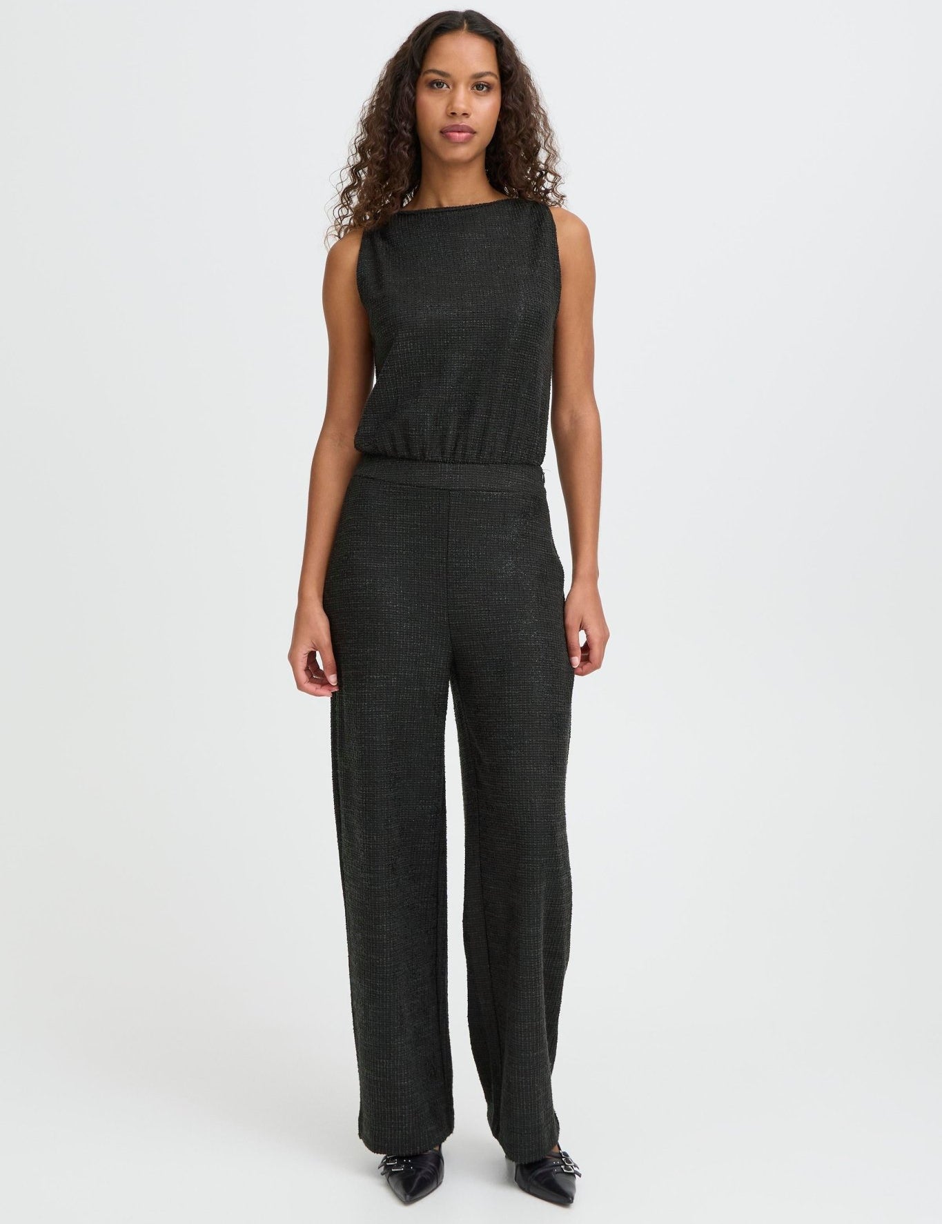 Schwarzer Jumpsuit mit weitem Bein - Blossom Hair & Fashion