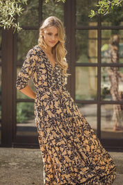 Schwarzes Maxikleid mit Blumenmuster und V-Ausschnitt - Blossom Hair & Fashion