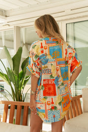 Sommerbluse mit Print und Knopfleiste in Oversized - Passform - Blossom Hair & Fashion