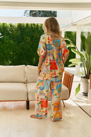 Sommerbluse mit Print und Knopfleiste in Oversized - Passform - Blossom Hair & Fashion