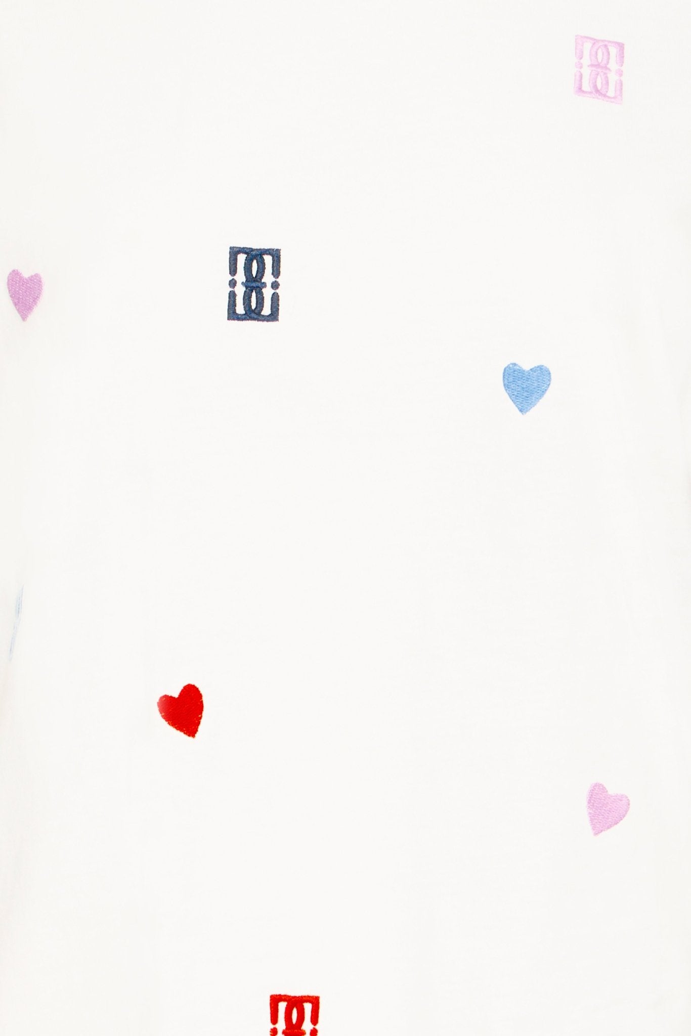 Weißes T Shirt mit bunter Stickerei und Herzmotiven - Blossom Hair & Fashion