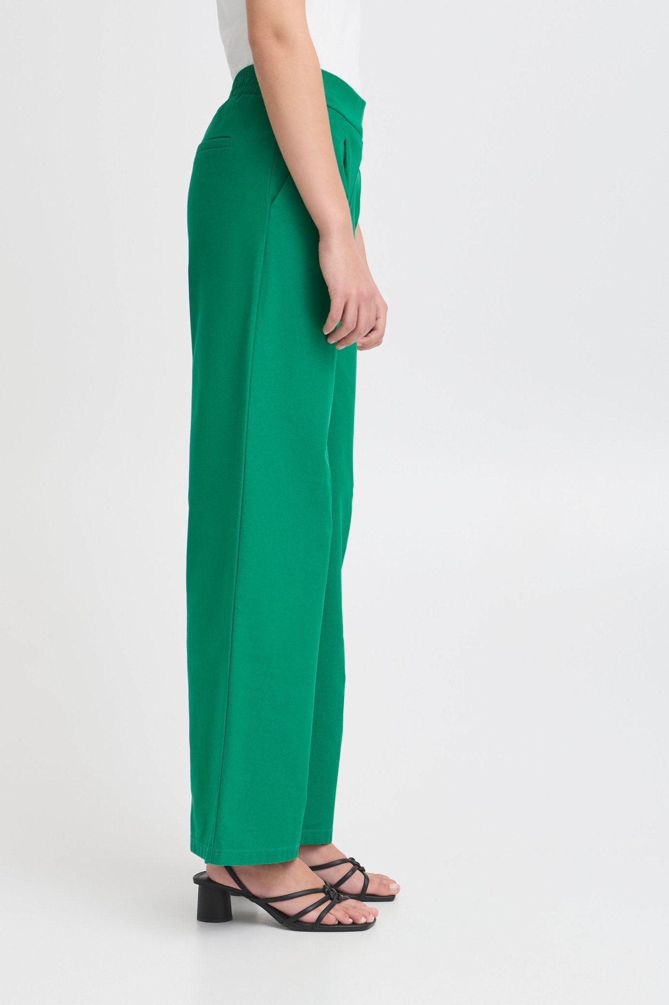 Weit geschnittene grüne Hose mit High - Waist - Blossom Hair & Fashion