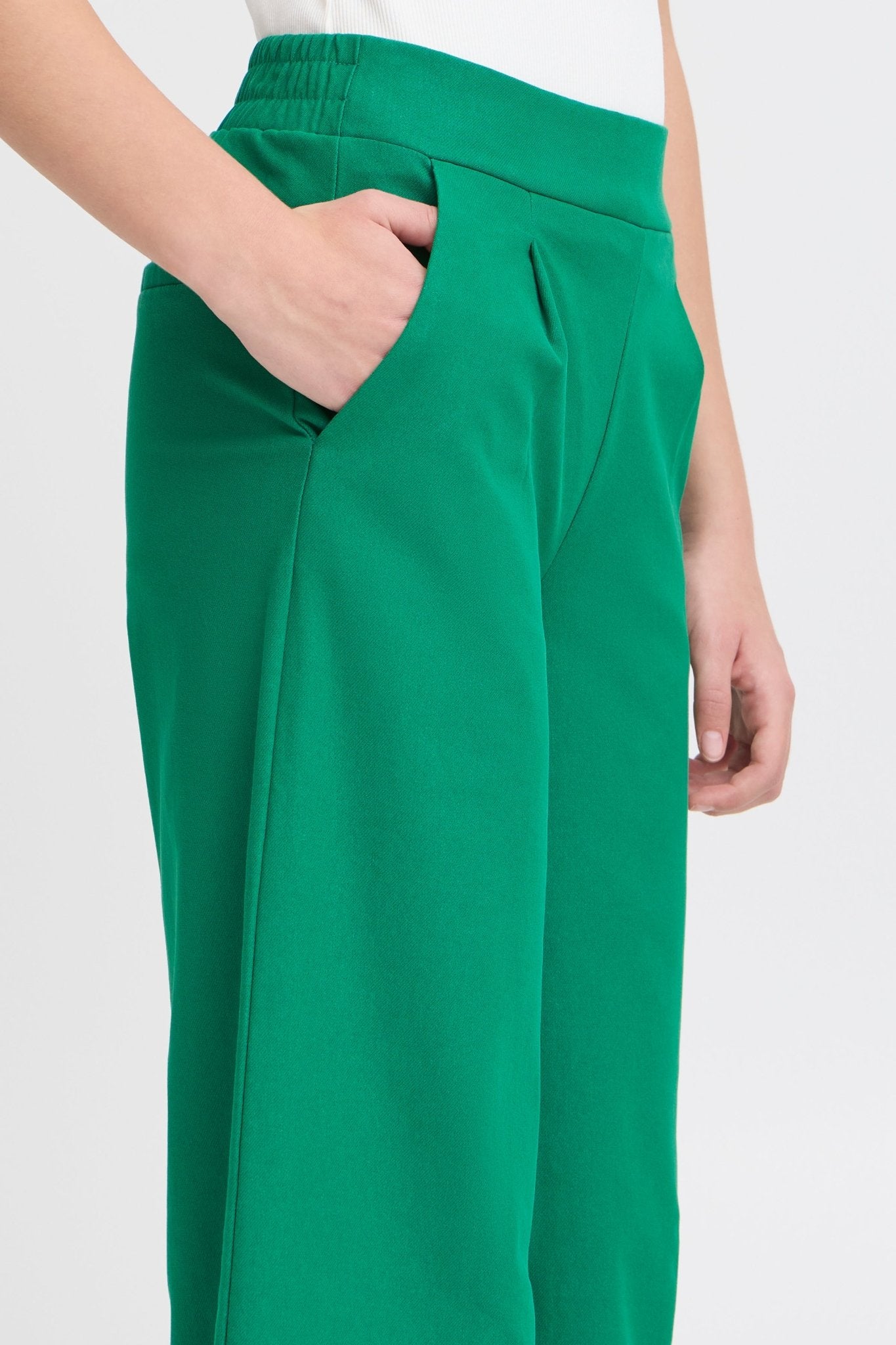Weit geschnittene grüne Hose mit High - Waist - Blossom Hair & Fashion