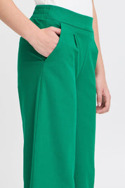 Weit geschnittene grüne Hose mit High - Waist - Blossom Hair & Fashion