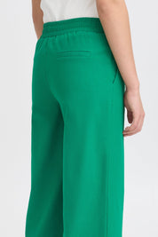 Weit geschnittene grüne Hose mit High - Waist - Blossom Hair & Fashion