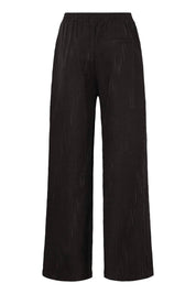 Weite Hose in Schwarz mit feiner Struktur - Blossom Hair & Fashion