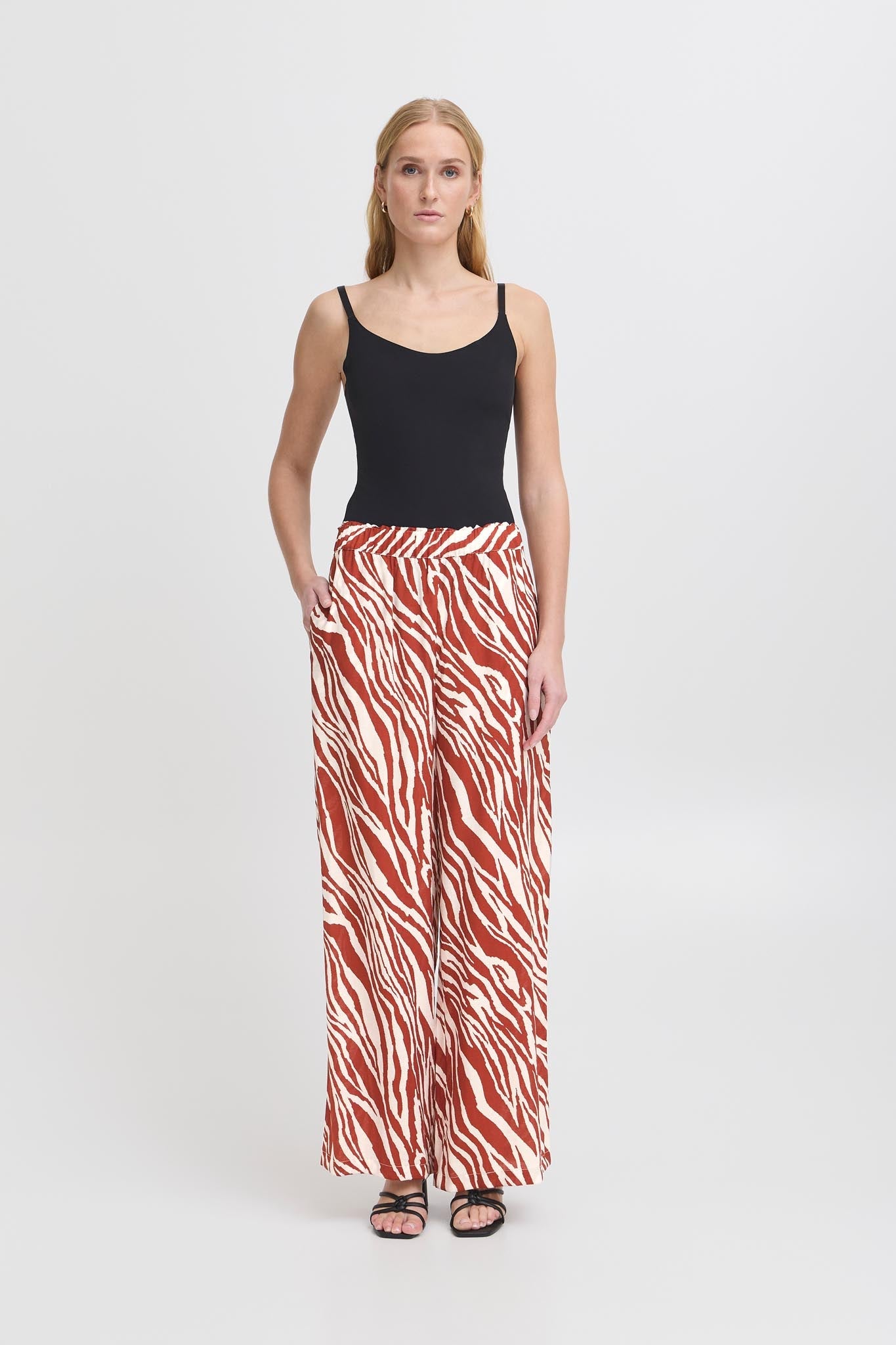 Weite Hose mit Animalprint und elastischem Bund - Blossom Hair & Fashion
