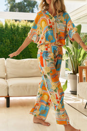 Weite Sommerhose mit Print und elastischem Bund - Blossom Hair & Fashion