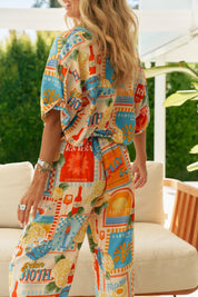 Weite Sommerhose mit Print und elastischem Bund - Blossom Hair & Fashion